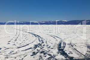 Winter ice road through Baikal