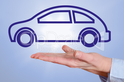 Hand holding car