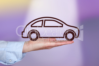 Hand holding car