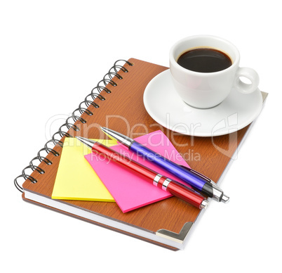 notebook and cup of coffee