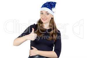Photo of woman in xmas hat with thumb
