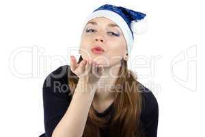 Photo of kissing young woman in christmas hat