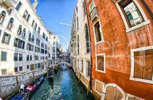 VENICE - APRIL 7, 2014: Tourists enjoy city canals on a beautifu