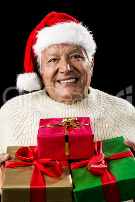 Aged Man Offering Three Wrapped Christmas Presents