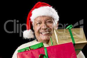 Jolly Old Man With Santa Cap And Three Xmas Gifts