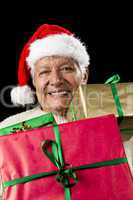 Aged Gentleman Peering Across Three Wrapped Gifts