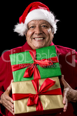 Jolly Male Pensioner In Red With Two Wrapped Gifts