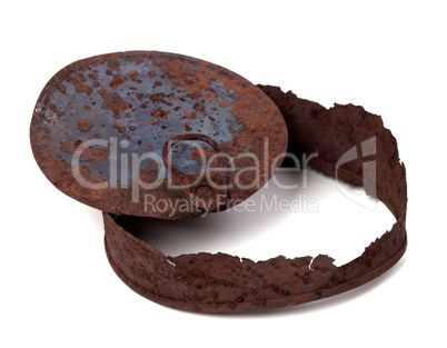 Old rusty tin can on white background