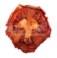 Dried slice of tomato. Isolated on white background.