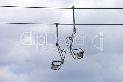 Chair-lift and overcast sky