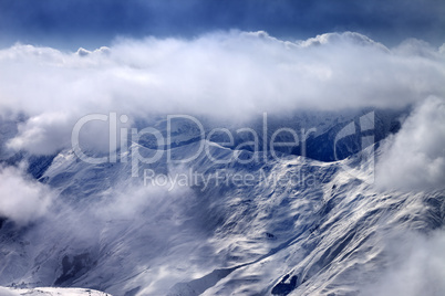 View on snowy mountains at mist