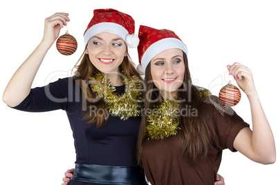 Image of two young women in christmas hats