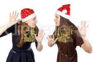 Photo of two eavesdropper young women