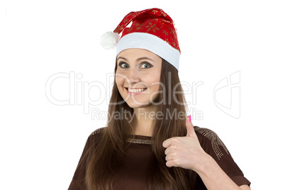 Portrait of woman in xmas hat with thumb