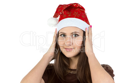 Photo of young woman correcting her hat