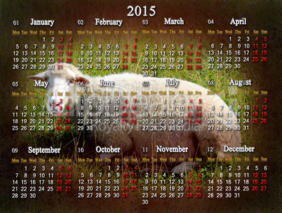 calendar for 2015 with sheep on the background
