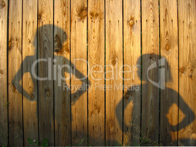 Shadow of boy and girl staring each other