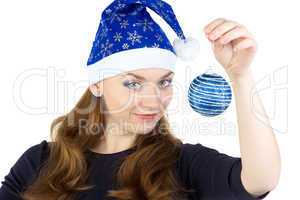 Portrait of young woman with christmas balls