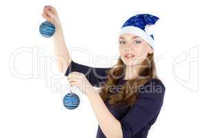 Portrait of woman with christmas balls in hat