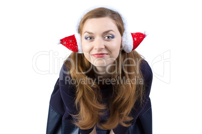 Portrait of happy young woman in winter headphones