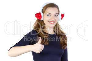 Image of pleased woman in winter headphones