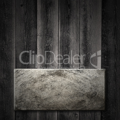 Wooden background with old iron plate