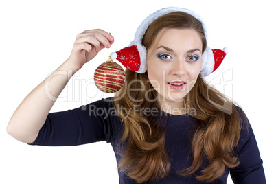 Photo of woman in winter headphones with ball