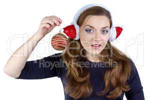 Photo of woman in winter headphones with ball