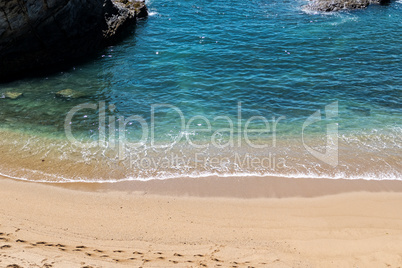 Wave of the Sea on the Sand Beach