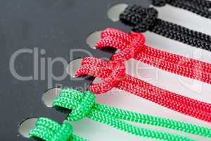 Knots on the Colorful Cords