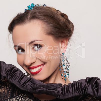 Portrait of young woman in evening makeup