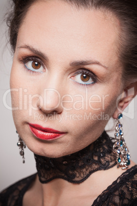 Portrait of young woman in evening makeup