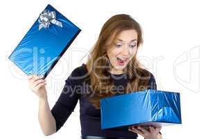 Image of surprised woman received the gift