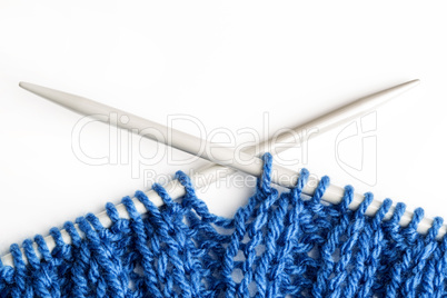 Closeup of a blue knitted scarf