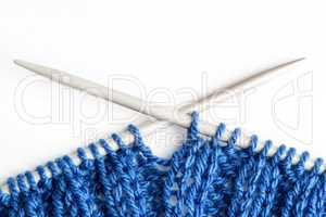 Closeup of a blue knitted scarf