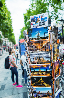 PARIS - JUNE 14, 2014: Postcards on a city street. More than 30