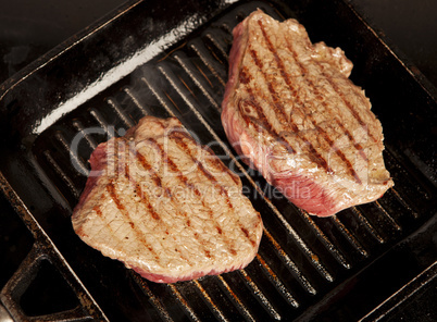 two steaks in the pan
