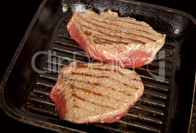 Beef roasts in the pan