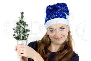 Photo of woman with small christmas tree