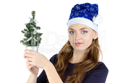 Image of woman with small christmas tree