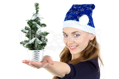 Woman with the small christmas fir tree