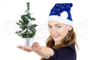 Woman with the small christmas fir tree