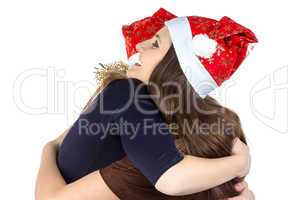 Image of two hugging young women