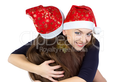 Portrait of two hugging young women