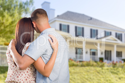 Military Couple Looking at Nice New House