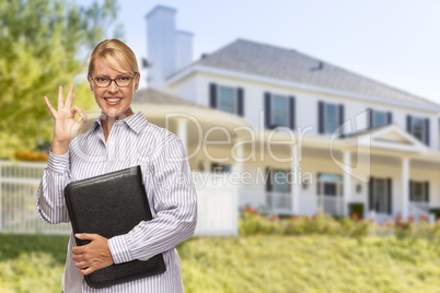 Attractive Businesswoman In Front of Nice Residential Home