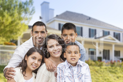 Hispanic Family in Front of Beautiful House