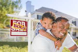 African American Father and Mixed Race Son, Sold Sign, House