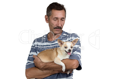 Photo of the old man looking at dog