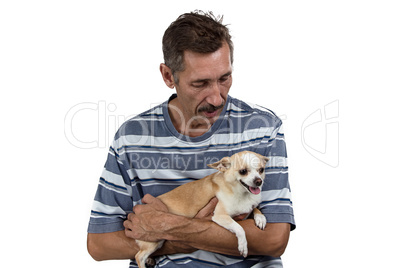 Image of the old man looking at dog